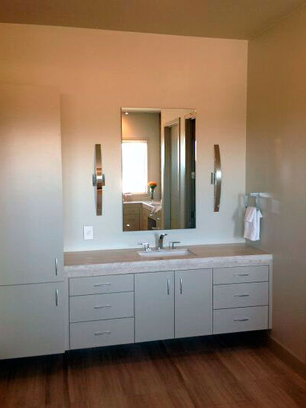 Frameless mirror in a bathroom
